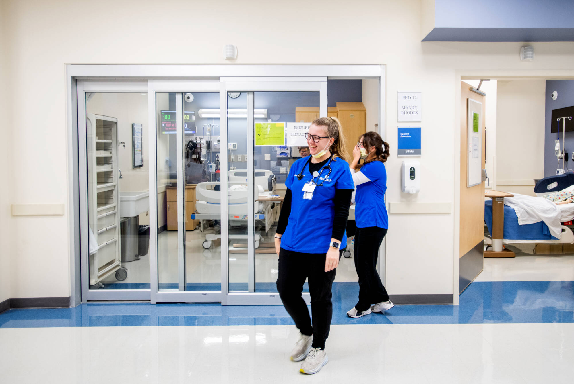 Students walking through simulation center